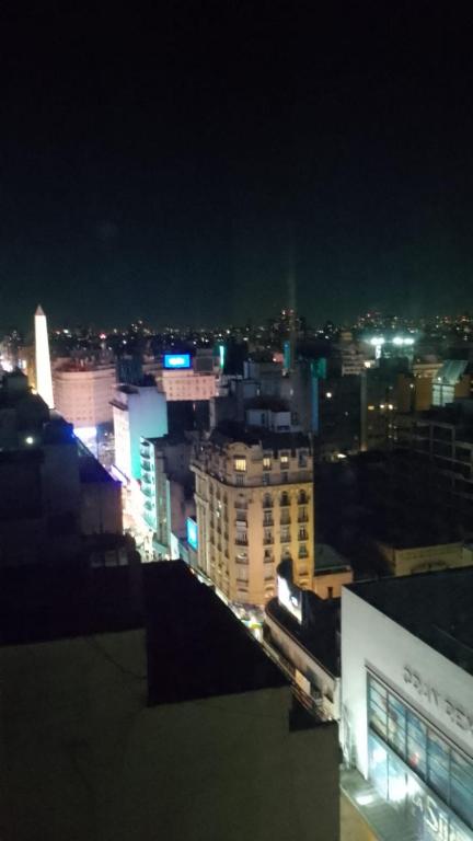 a view of a city at night with lights at Apart Rilax in Buenos Aires
