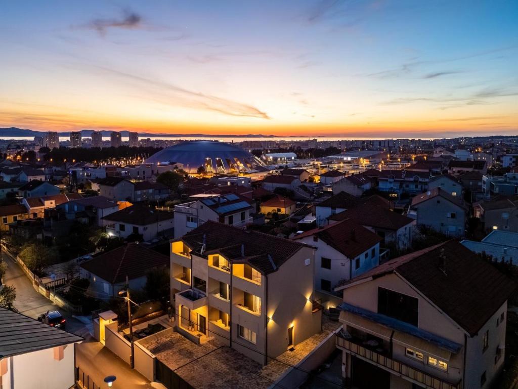 an aerial view of a city at night at Villa Mart in Zadar