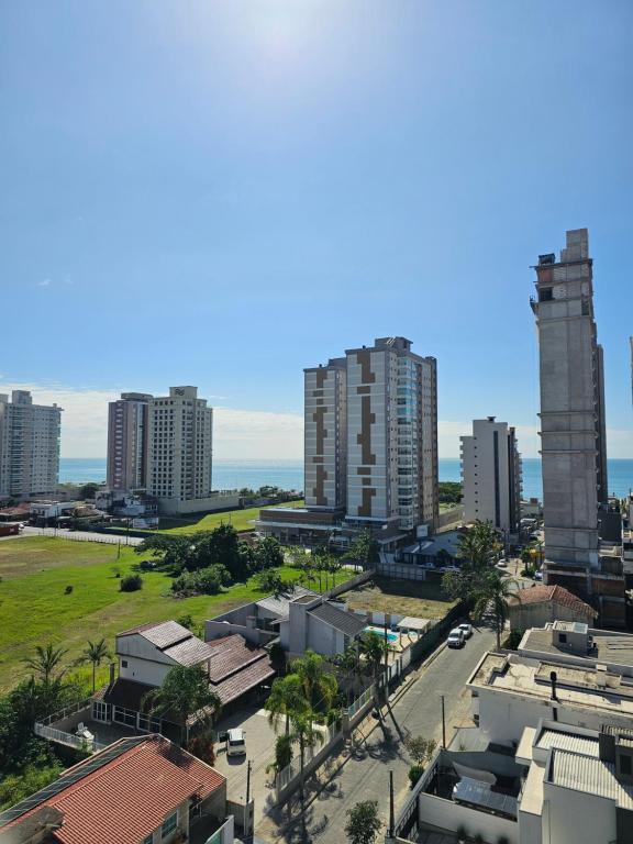 an aerial view of a city with tall buildings at Apto.napraia BEACH 901 em Piçarras com vista mar in Piçarras