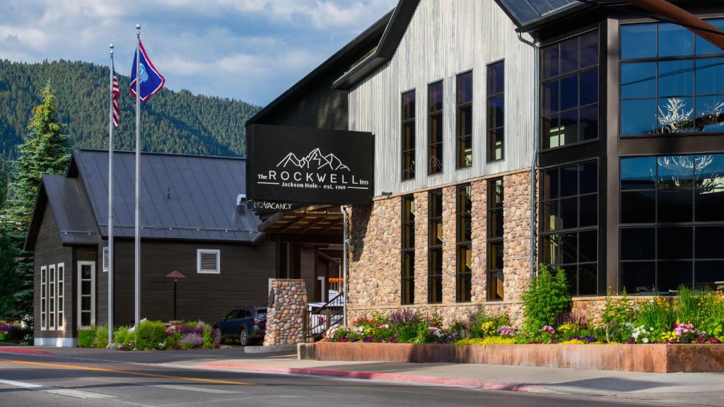 a building with a sign on the front of it at The Rockwell Inn in Jackson