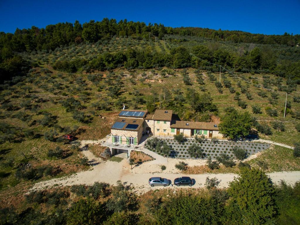 an aerial view of a house on a hill at Pekko in Spello