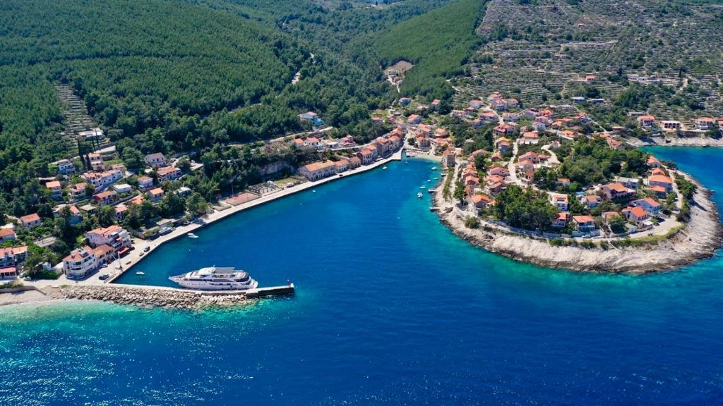 an aerial view of a boat in a river at Apartmani Antula in Prigradica