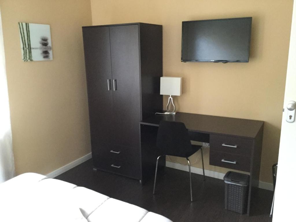 TV a/nebo společenská místnost v ubytování Domus Corso Umberto 18 B&B