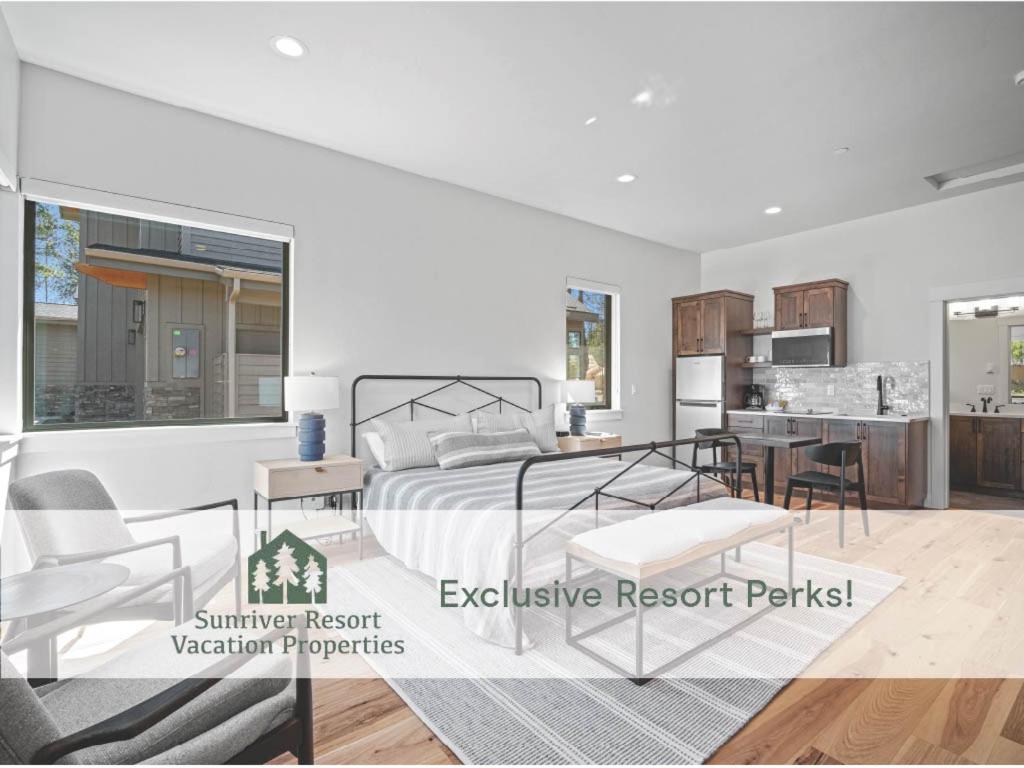 a bedroom with a bed and a living room at 18163-2 Forestbrook Loop in Bend