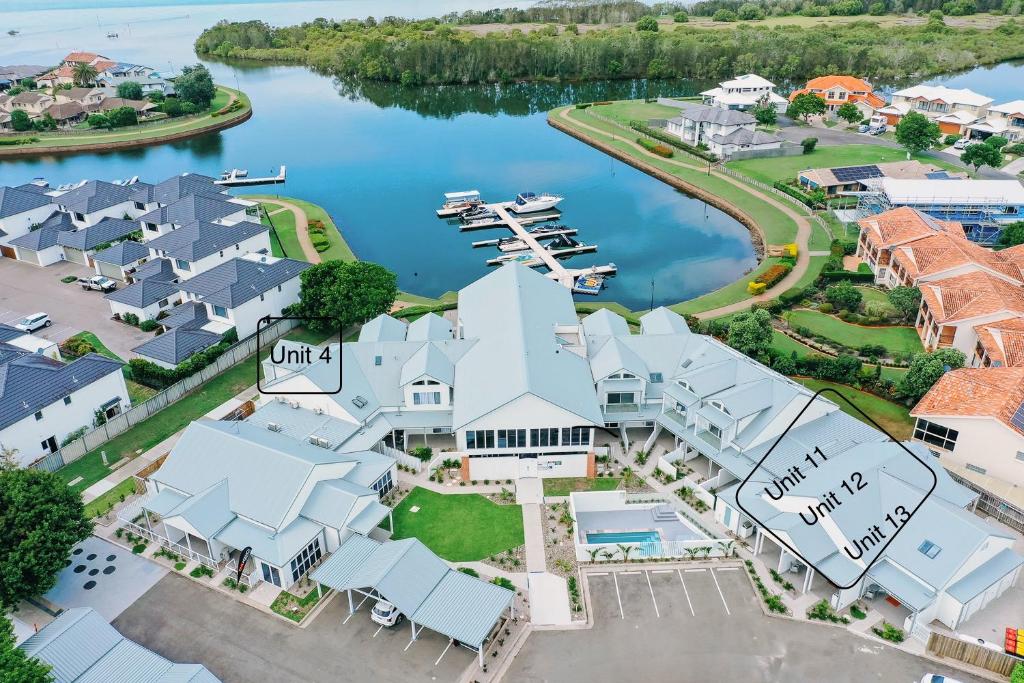 an aerial view of a resort with a marina at Harrington Marina in Harrington