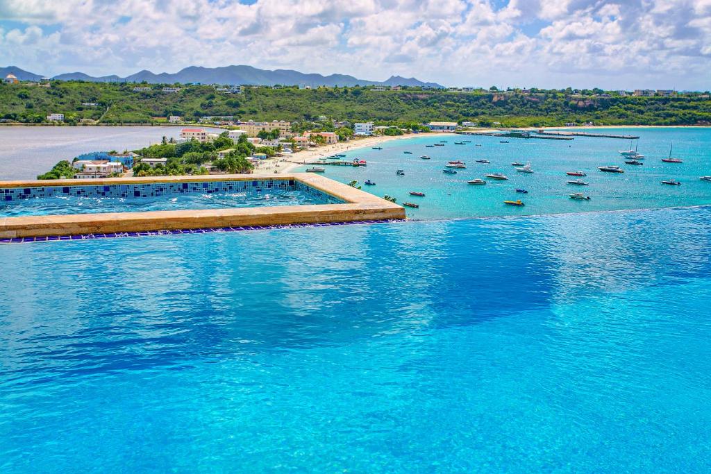 an aerial view of a large body of water with boats at Villa Nirvana in North Hill Village