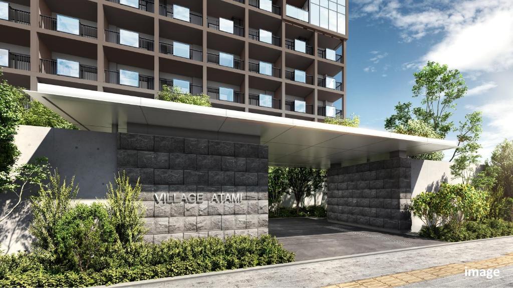 a rendering of the entrance to a building at Village Atami in Atami