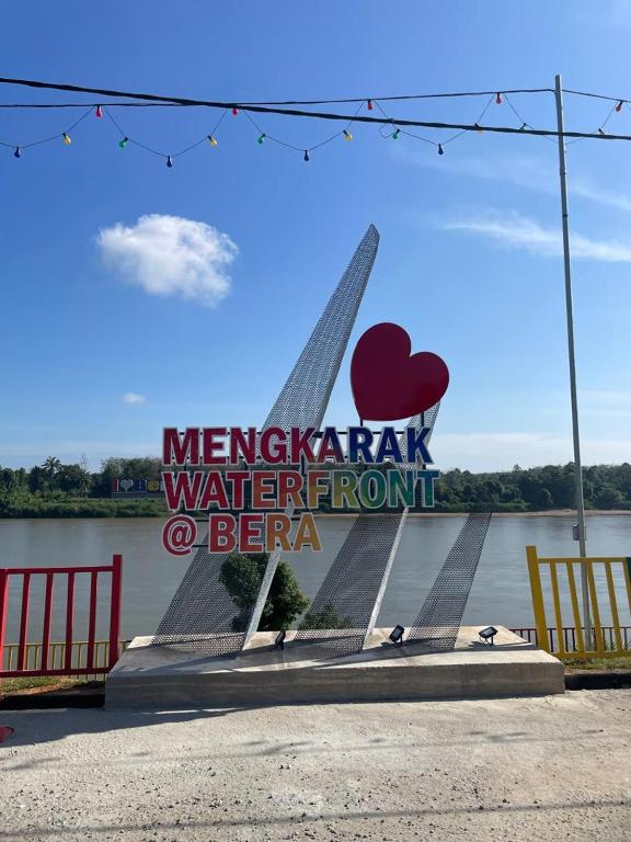 a sign for the merida park waterfront sign at Casadana Riverview in Kampong Gemuroh