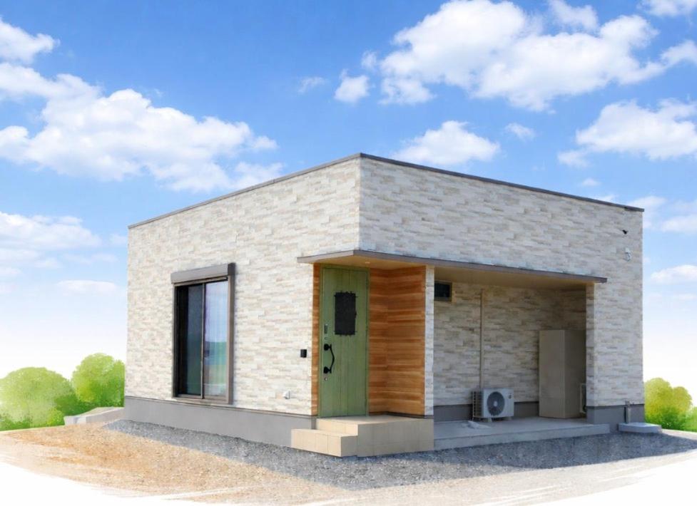 a rendering of a small house with a green door at Private house 海Kai in Nagato