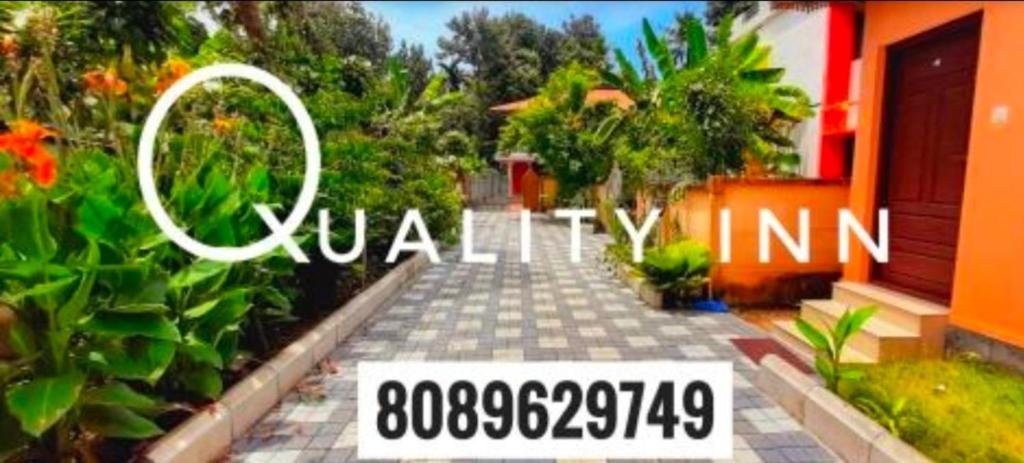 a picture of a house with the words villinian at Quality Inn Resort in Varkala