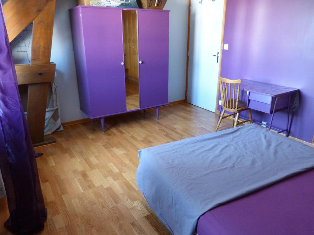 מיטה או מיטות בחדר ב-Entre Vignes Et Marais
