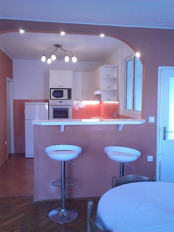 Kuchyň nebo kuchyňský kout v ubytování Apartman Vladić