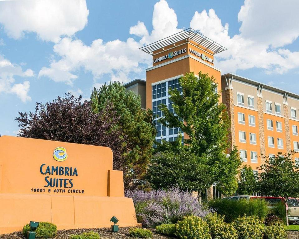 a campus sign in front of a building at Cambria Hotel Denver International Airport in Aurora