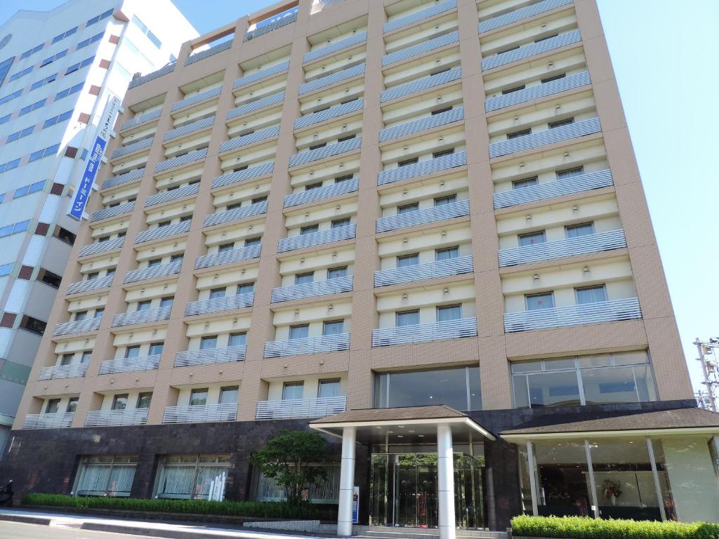 an external view of a building at Dormy Inn Akita in Akita