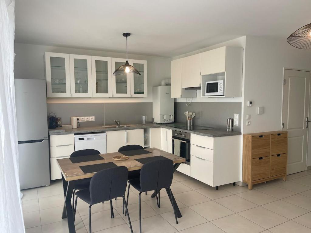 Appartement cosy avec garage et terrasse près de la mer