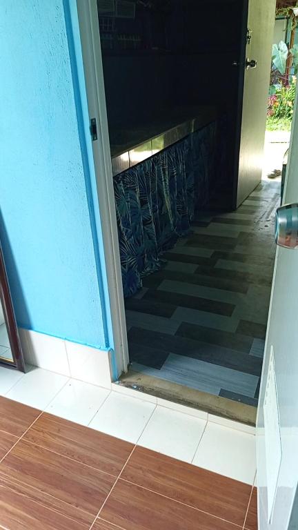an open door of a house with a tile floor at Sarah House Rental in Clarin