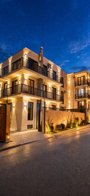 a large white building with balconies on the side of it at Natali Apart-hotel in Tbilisi City