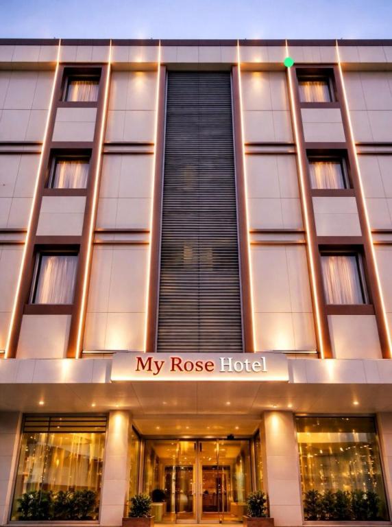 a building with a spiral staircase in front of it at My Rose Hotel in Istanbul