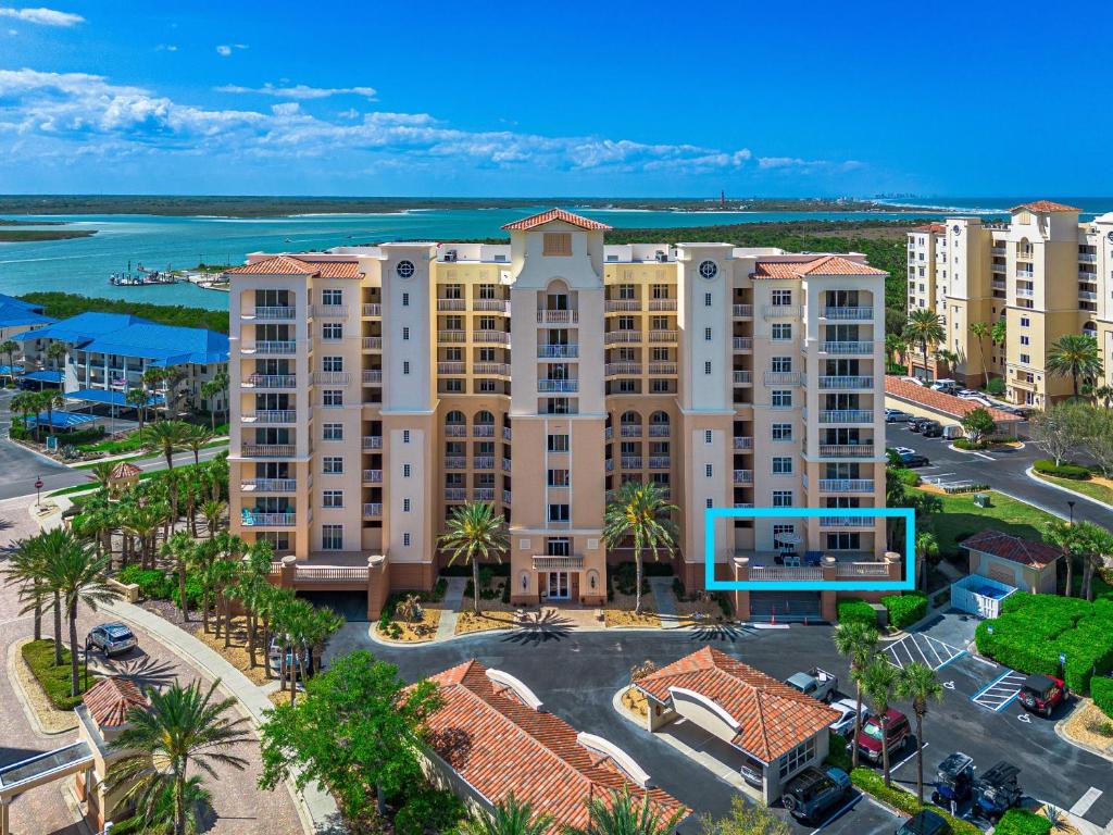 an aerial view of a building in a resort at Coastal Serenity Spacious 3Br Condo In Minorca in New Smyrna Beach