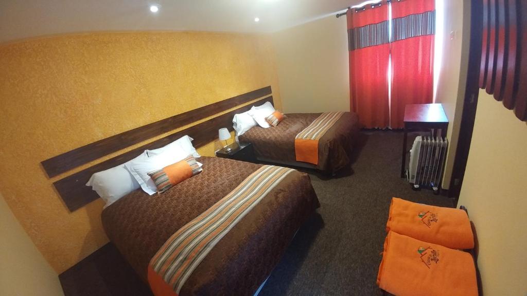 Postel nebo postele na pokoji v ubytování Vita Hoteles Colca