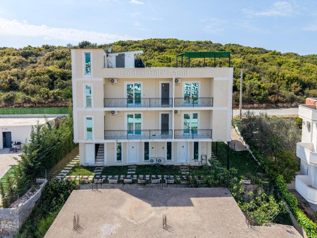 an aerial view of a white building at Golden Hill Ksamil in Ksamil