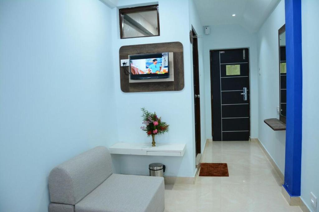 TV a/nebo společenská místnost v ubytování Hotel Landmark