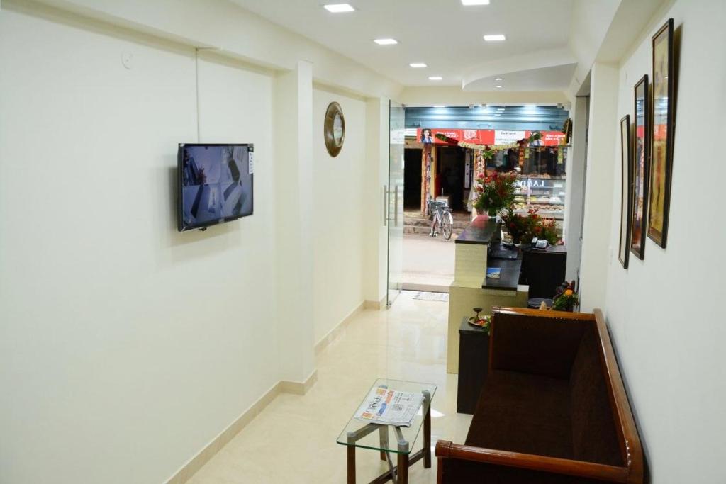 TV a/nebo společenská místnost v ubytování Hotel Landmark