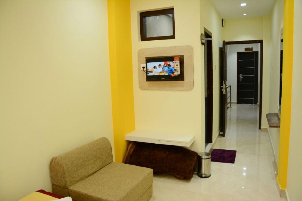TV a/nebo společenská místnost v ubytování Hotel Landmark