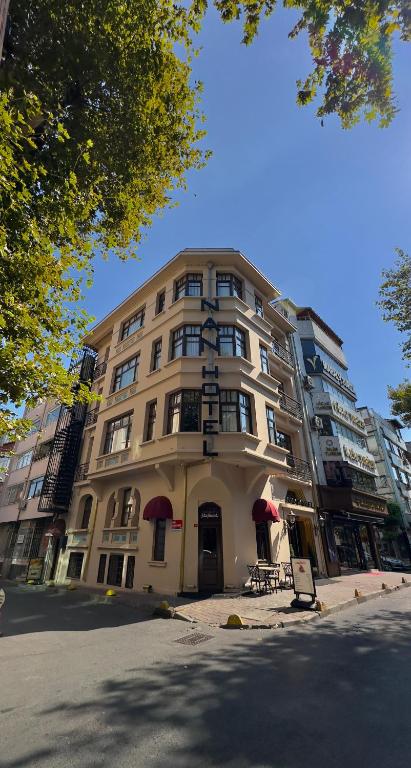 a large building on the corner of a street at Nan Hotel in Istanbul