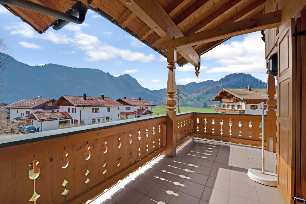 a balcony with a view of the mountains at Petrushof Ferienwohnung Taubensee in Oberwössen