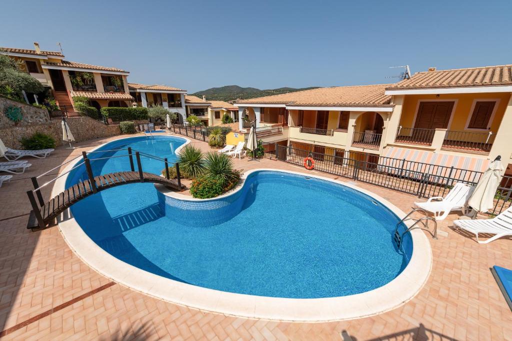 an overhead view of a swimming pool in a house at Residenza del Sole 1 in Villasimius