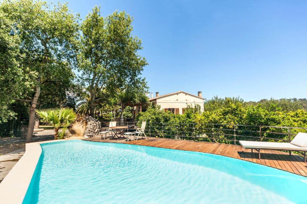 a swimming pool in the backyard of a house at Sa Teulera de Sencelles in Sencelles