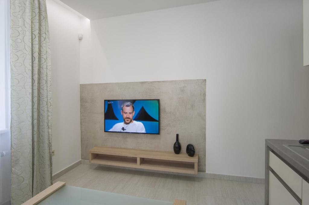 TV a/nebo společenská místnost v ubytování HOTEL A RESTAURACE U STAVAŘE