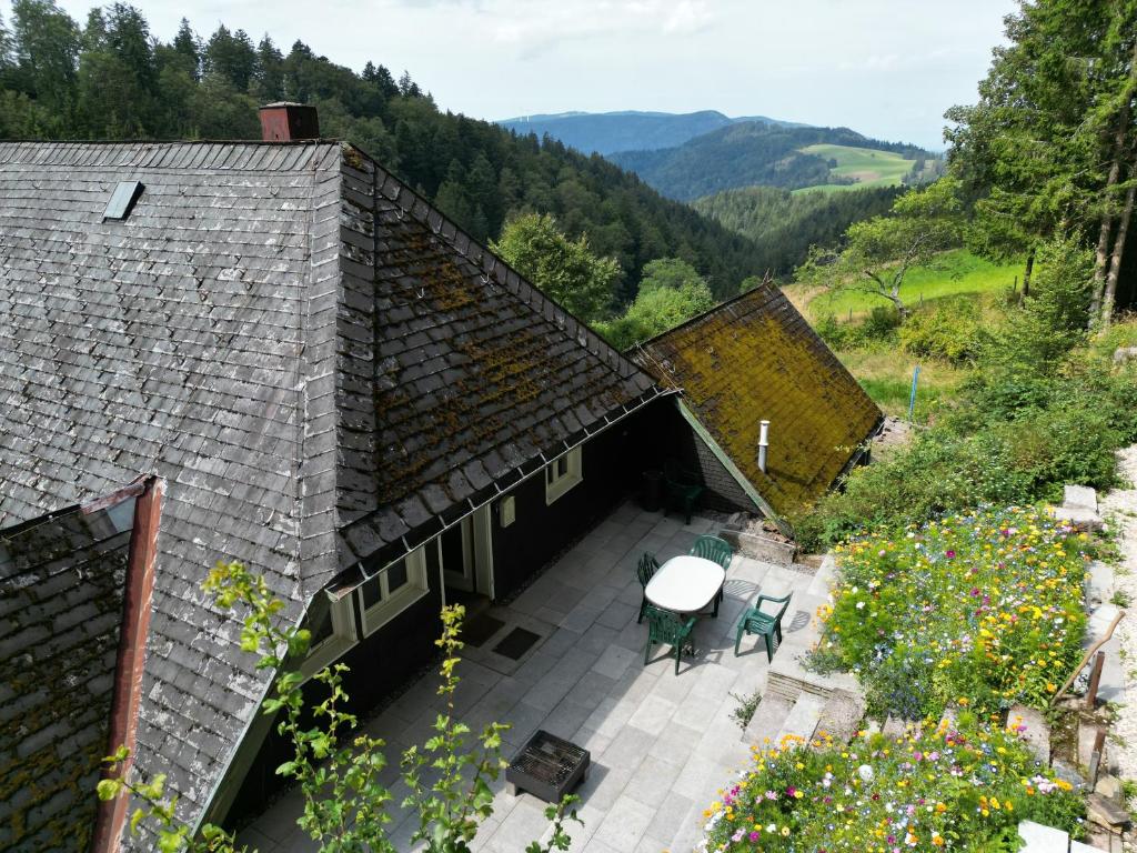 an aerial view of a house with a patio at Schwarzwald Chalet - Karlshütte in Neuweg