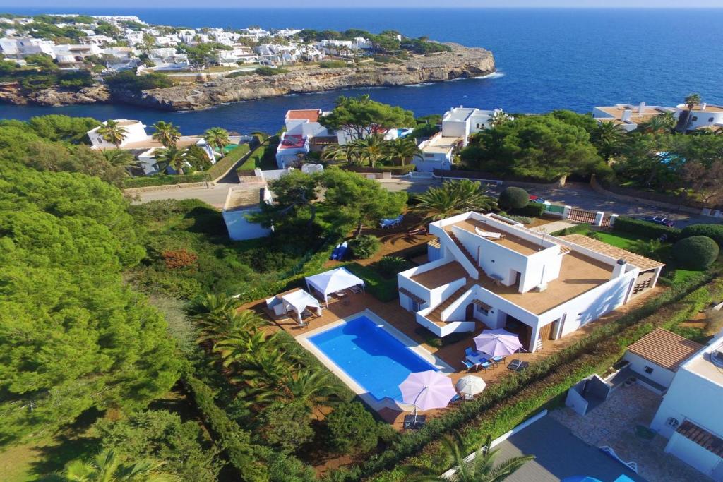 an aerial view of a villa with a swimming pool at Luna in Cala d´Or