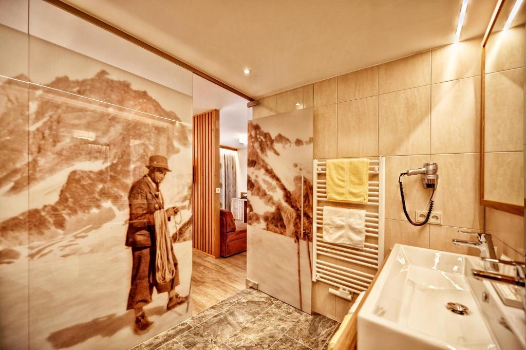 Koupelna v ubytování Hotel Arnika