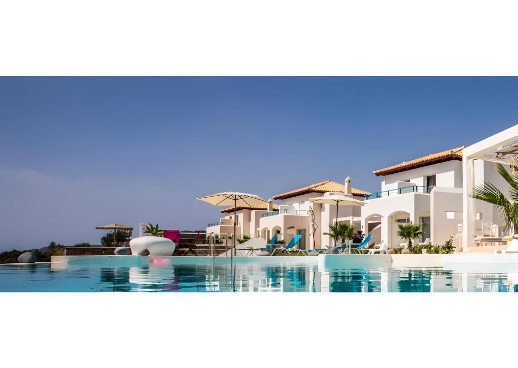 a view of a swimming pool at a resort at Kaladi Rock Ammos in Avlemonas