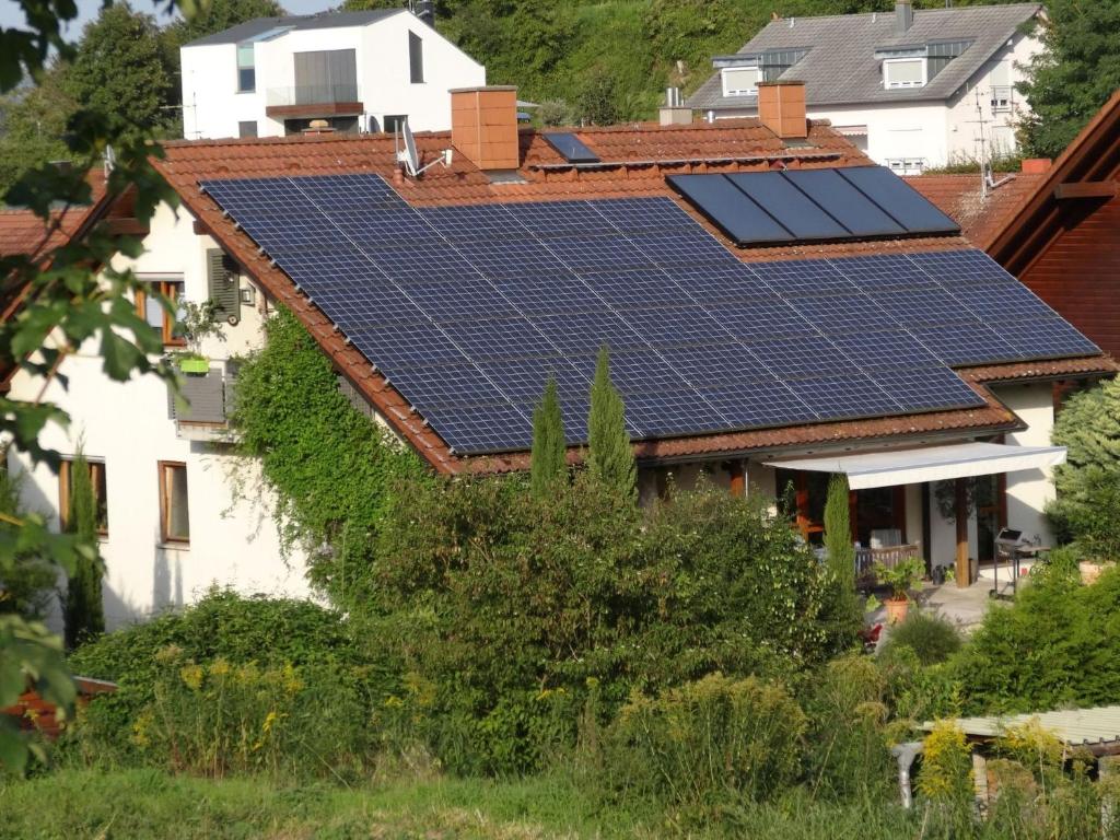 a house with solar panels on its roofs at Fewo im sonnigen Kaiserstuhl in Endingen