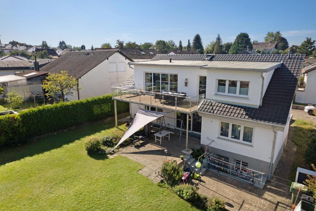 an aerial view of a house with a roof at Wolf's Apartment Rheintal in Renchen