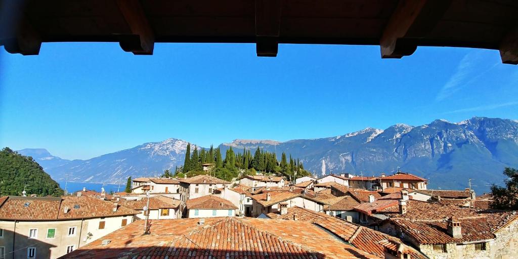 a view of a town with mountains in the background at Liver 202 in Tremosine Sul Garda