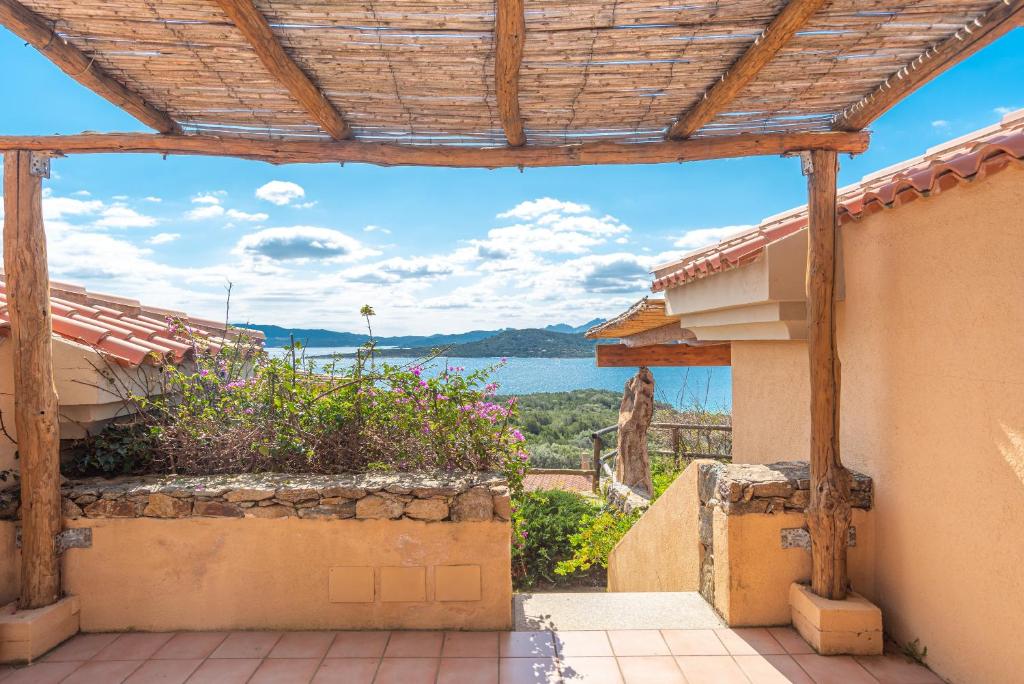 a house with a view of the water at Trilocale N8 - Porto Mannu in Palau