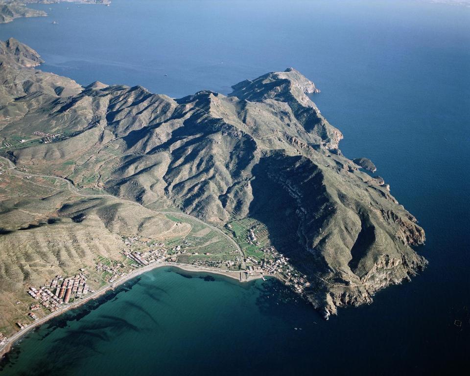 an aerial view of an island in the water at La Azohía Espacio en Calma in La Azohía