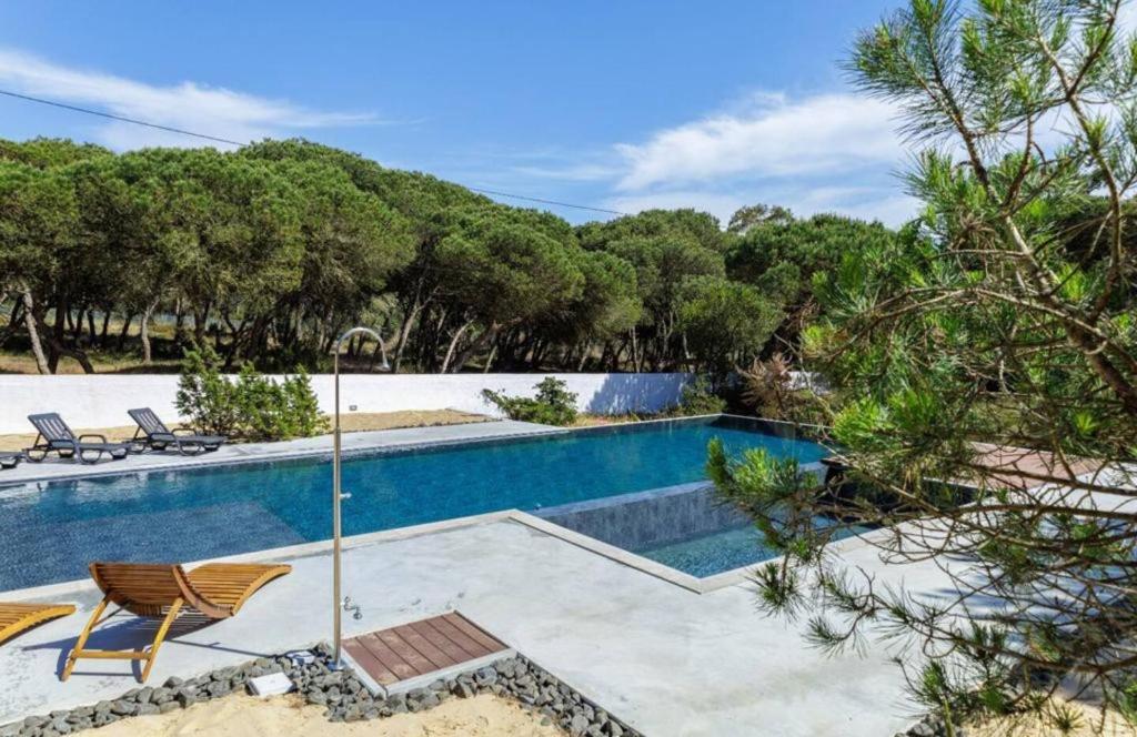 an image of a swimming pool in a villa at Forest Village T2 in Mindel