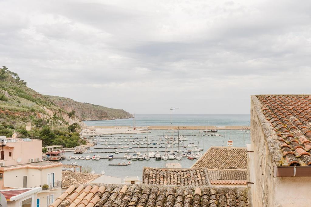 a view of a harbor with boats in the water at Casa Mauro e Roberta Zingaro in Castellammare del Golfo