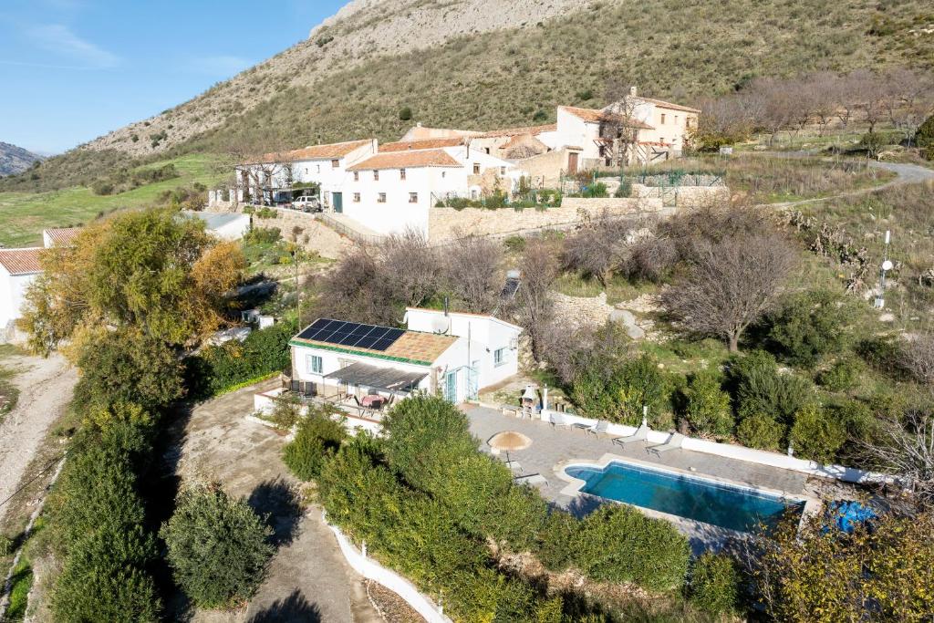 an aerial view of a house on a hill at Finca Carrion in Periana