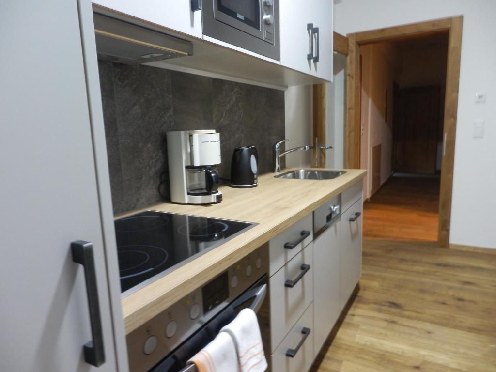 Kuchyň nebo kuchyňský kout v ubytování Haus Alpenflora