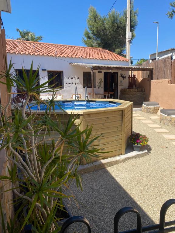 a house with a swimming pool in the yard at Casa Amigos Rural in Cuevas del Almanzora