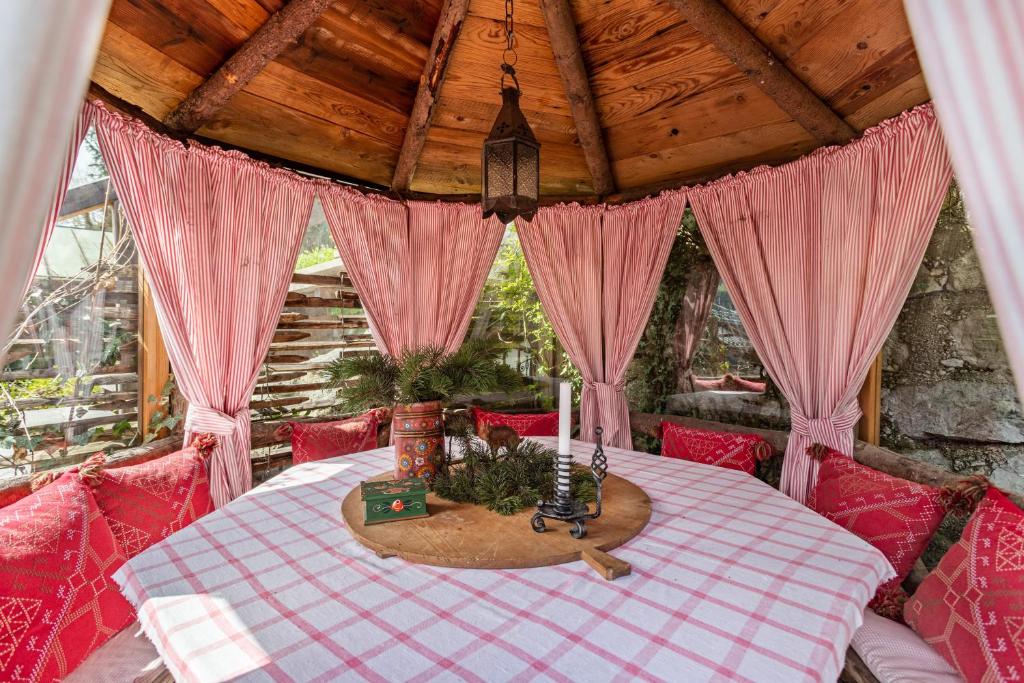 a room with a table with a christmas tree on it at Ferienappartement 1 - Lockstein in Berchtesgaden