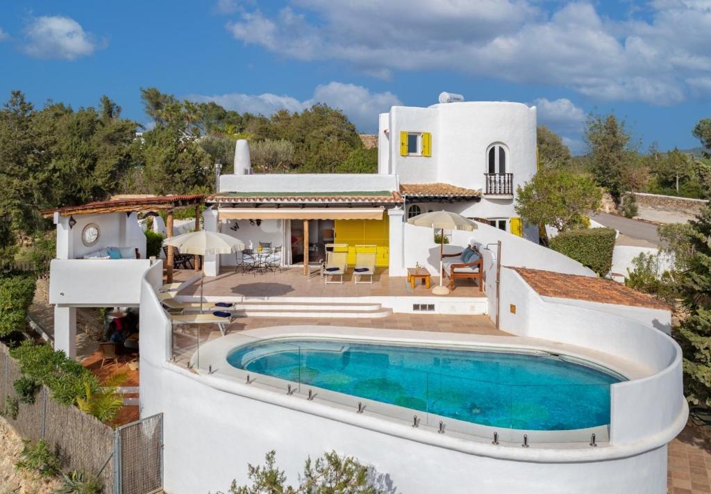 an aerial view of a villa with a swimming pool at Villa Torre Xanchu in Sant Josep de sa Talaia
