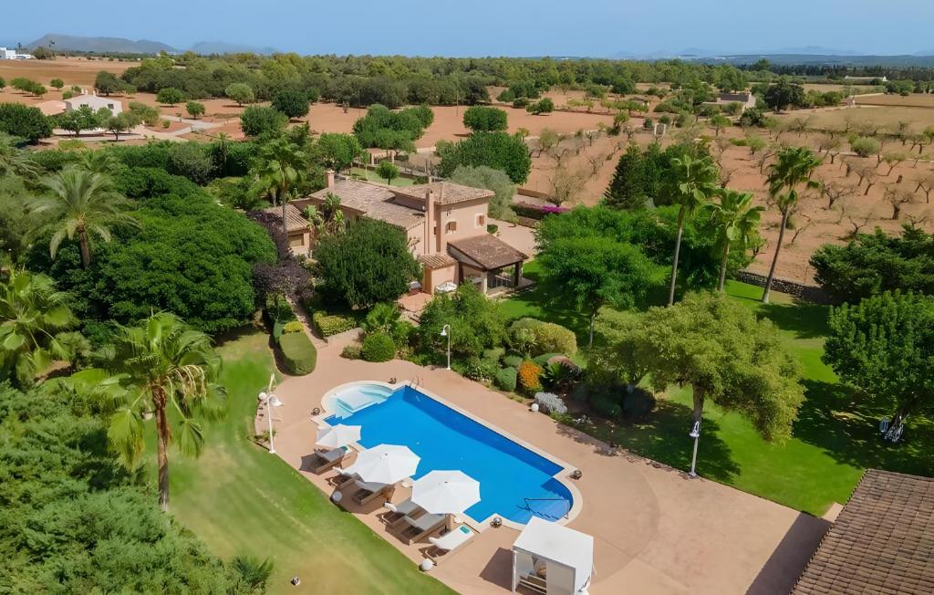 an aerial view of a resort with a swimming pool at Villa Privada De Lujo Con Spa in Inca